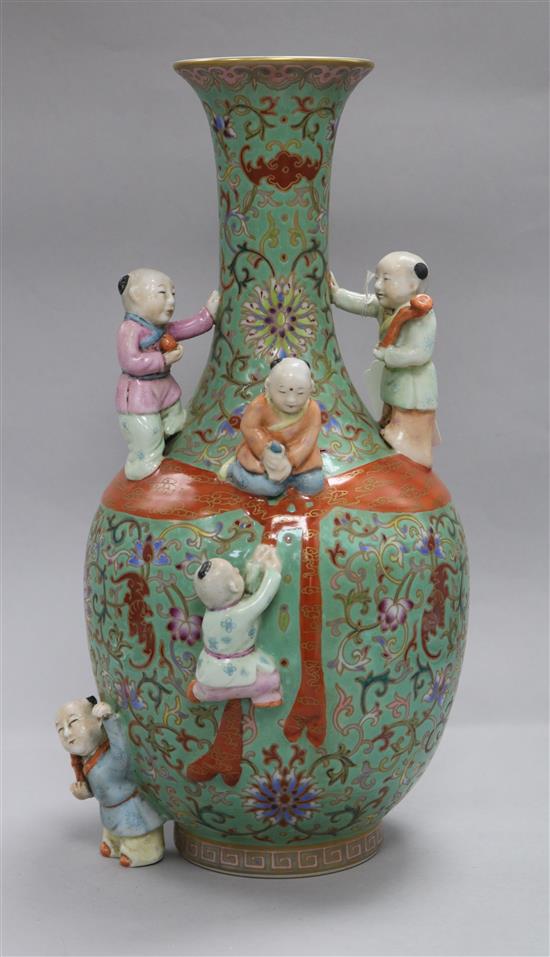 A Chinese green ground Boys vase